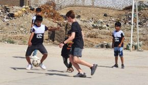 Kids playing soccer in Peru